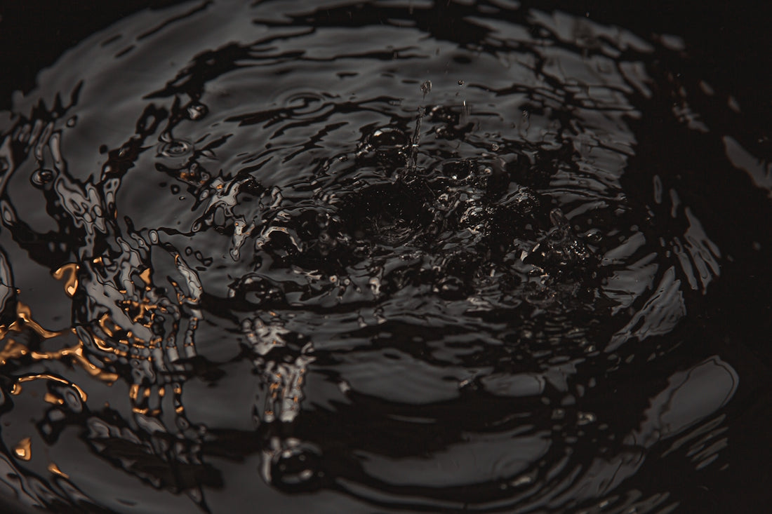 water droplets on body of water