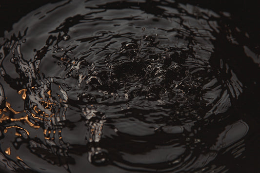 water droplets on body of water
