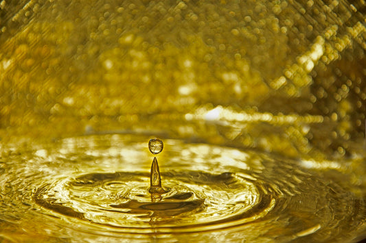 Understanding the Role of Water and Oil in Hair Care Routines - Natures Melanin