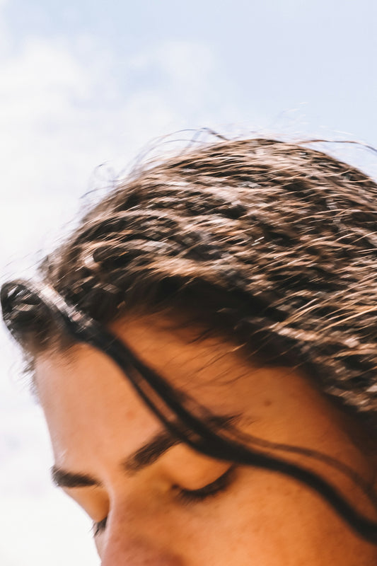 person wearing black framed eyeglasses
