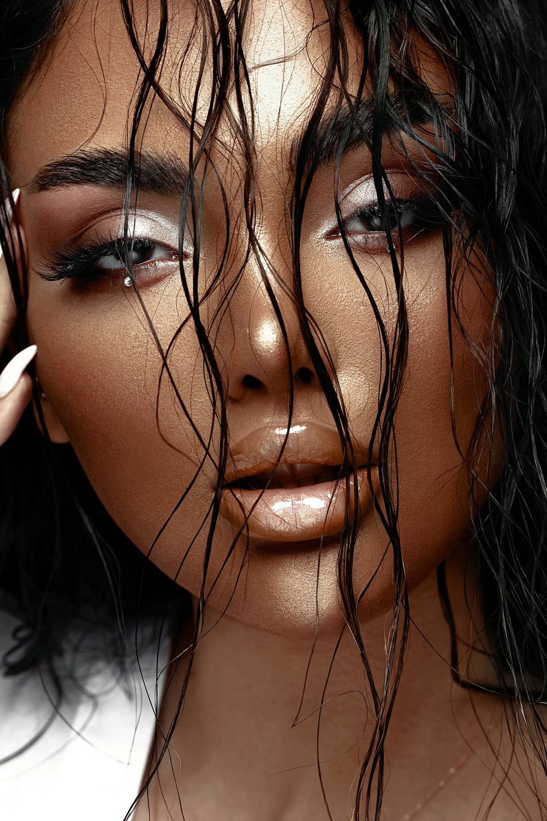 a close up of a woman with wet hair